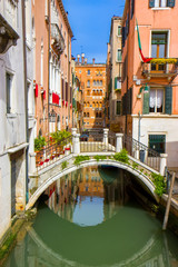 Fototapeta na wymiar Small bridge in the Venice canal