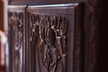 Close-up photo of a classic handmade carved furniture.