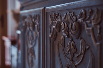 Close-up photo of a classic handmade carved furniture.
