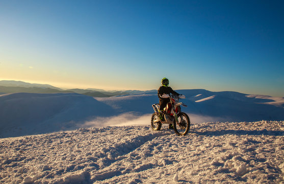 Motorcycle extreme sport bike winter snowy mountains
