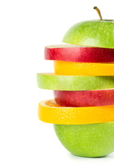 Fruit slices. Stack of mixed fruit closeup