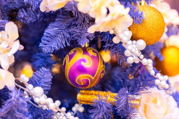 Fototapeta na wymiar Closeup on Christmas tree decoration over festive background