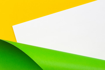 Abstract geometric white yellow and green color paper background.