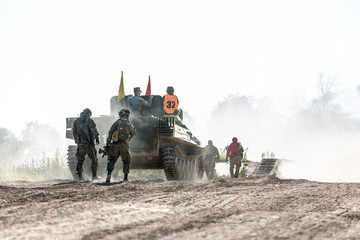 group of soldiers on the Outdoor on army exercises. war, army, technology and people concept