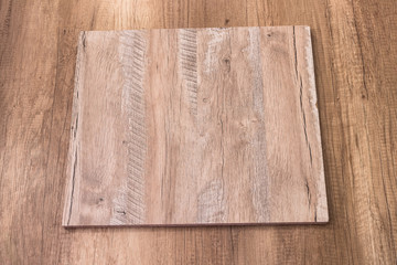 Textured wooden plank used as background .