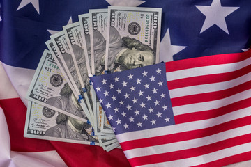 Banknotes of american dollar on national flag