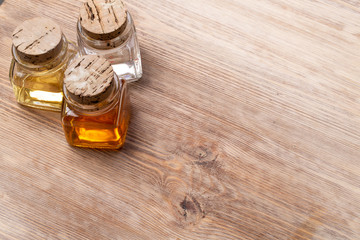 Obraz na płótnie Canvas olive oil and vinegar on a wooden