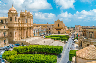 Panoramic view in Noto, with the Cathedral, Palazzo Ducezio and the Santissimo Salvatore Church. Province of Siracusa, Sicily, Italy.