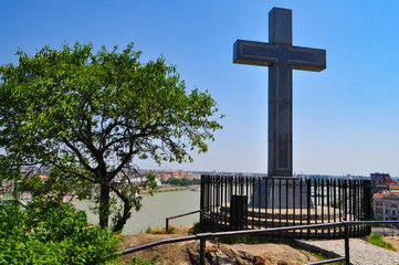 cross on a mountain in budapest overlooking the danube