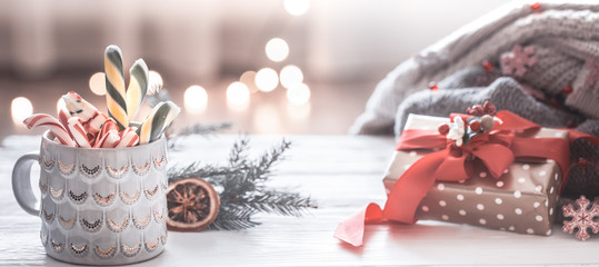 Christmas festive background with cup and festive decor