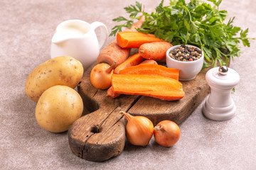 Fresh ingredients for tasty pureed carrot soup. Healthy food