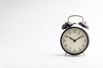 Clock isolated on white background with selective focus and crop fragment