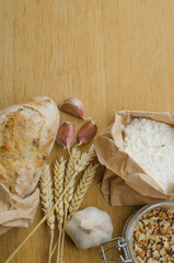 Homemade garlic nut bread on a wooden background