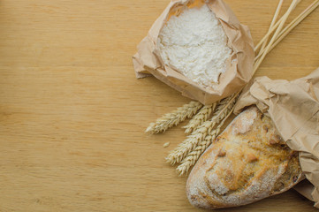Homemade garlic nut bread on a wooden background
