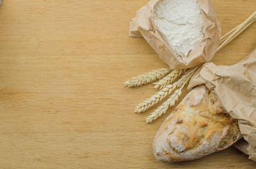Homemade garlic nut bread on a wooden background