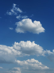 Fototapeta na wymiar Clouds on clear blue sky
