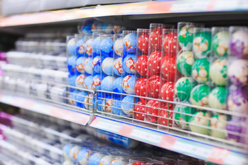 Decoration items for Thanksgiving and Christmas seasons in different designs and colors are displayed