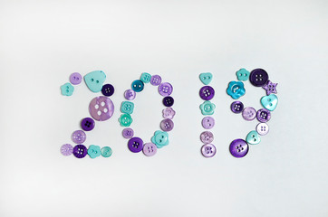 Buttons scattered on a white background