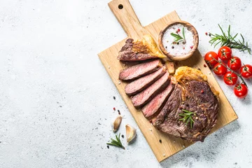 Foto op Plexiglas Grilled beef steak ribeye on white.  © nadianb