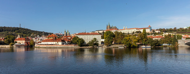 Naklejka premium Panoramic view of Prague and Danube river at daytime, Czech Republic, banner