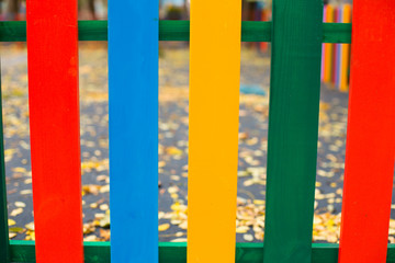 Multi-colored wooden fence.