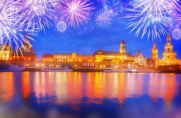 Fototapeta na wymiar Embankment of Dresden and river Elbe at night with fireworks, Germany