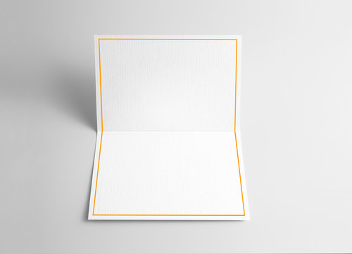 Blank folded thank you or greeting card with gold ribbon 