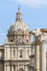 View of the Roman Forum and the city of Rome from Palatine Hill. The forum with its adjoining buildings is located in the center of ancient Rome. Temples, arches, basilicas and other buildings. 