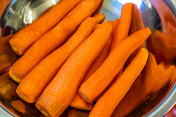 Pealed Carrots in Stainless Steel Bowl