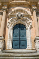 Obraz premium Main entrance to the Duomo of Saint George in Rgusa Ibla, Sicily, southern Italy.