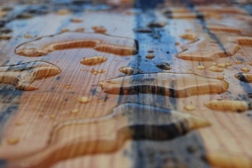 Naklejka premium Water drops on a desk