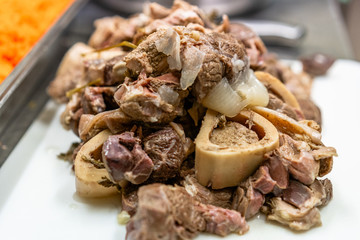 Freshly Boiled Pork on White Cutting Board on Table - Meal Preparation for Wedding