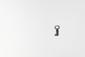old key on white background