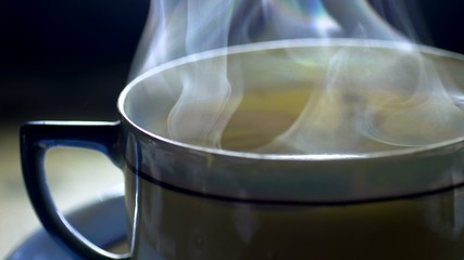 Close Up Of Pouring Tea Into A Japanese Ceramic Cup