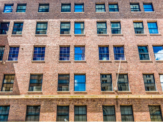 Sky Reflected in Old Windows