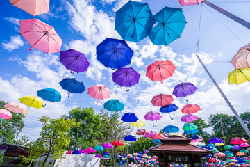 Fototapeta na wymiar Colorful umbrellas in the sky