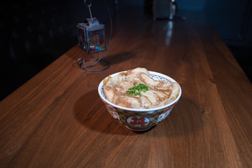 Close up view of plate with japanese food inside. Japan traditional food on wooden table. Selective focus