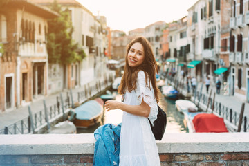 young girl walks the streets of Venice © teksomolika