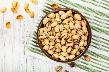 Sea Salt Roasted Pistachios Background. Selective focus.