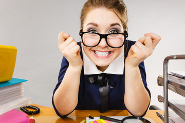 Happy business woman in office