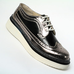 Women's shoes leather isolated on white background