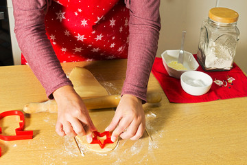 woman making cookies in christmas bakery  in home  kitchen
