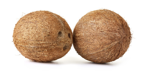 ripe whole coconut fruits isolated on white background