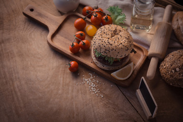Hamburger homemade on wood table.