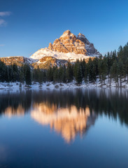 Fototapeta premium Antorno lake with famous Tre Cime di Lavaredo (Drei Zinnen) mount. Dolomite Alps, Province of Belluno, Italy, Europe. Beauty of nature concept background.