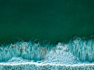 Just beyond the breakers