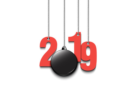 2019 New Year and hockey puck hanging on strings