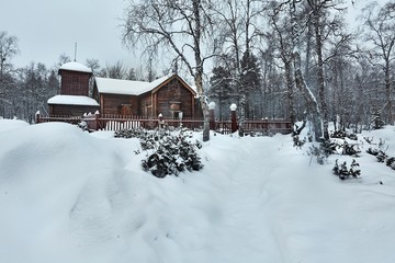 Old wooden church in winter