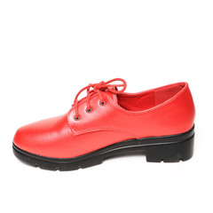 Women's platform red shoes isolated on white background