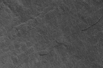 Dark grey black slate background or texture.